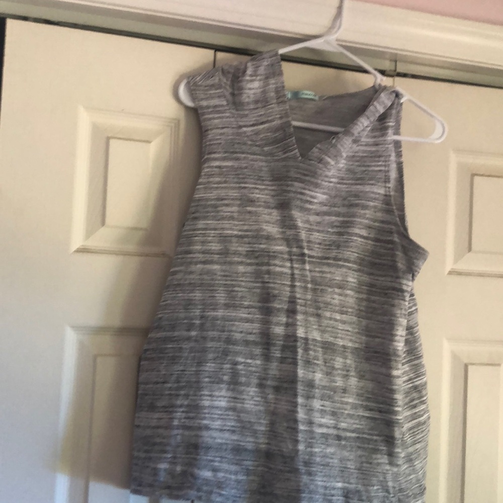 Woman’s sleeveless pull over with hood